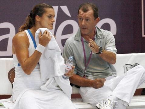 Amelie Mauresmo being coached by Loic Courteau - they are teaming up again to help Andy Murray